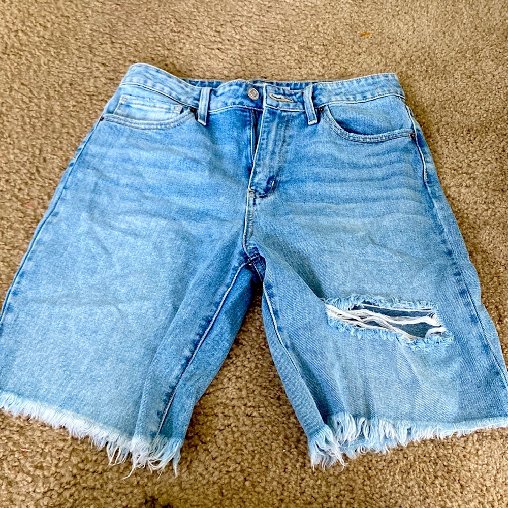 Fitted,longer than booty shorts but shorter than basketball shorts